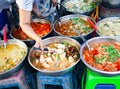 delicious fresh street food in Thailand - top view - Thai Curry, Tamarind, Tom Yam, Shrimp, Pork, Pad Thai Royalty Free Stock Photo