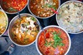 delicious fresh street food in Thailand - top view - Thai Curry, Tamarind, Tom Yam, Shrimp, Pork, Pad Thai Royalty Free Stock Photo