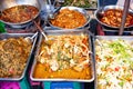 delicious fresh street food in Thailand - top view - Thai Curry, Tamarind, Tom Yam, Shrimp, Pork, Pad Thai Royalty Free Stock Photo