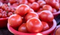 Delicious fresh tomatoes fruit vegetable food in red plastic basket at tradition market afternoon, Seoul, South Korea, harvest Royalty Free Stock Photo