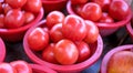 Delicious fresh tomatoes fruit vegetable food in red plastic basket at tradition market afternoon, Seoul, South Korea, harvest Royalty Free Stock Photo