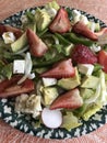 Delicious Fresh Tossed Salad with Strawberries Avocado and Feta Cheese