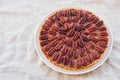 Delicious freshly baked homemade pecan pie on white background Royalty Free Stock Photo