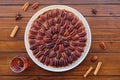 Delicious freshly baked homemade pecan pie on wooden background Royalty Free Stock Photo