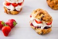 Delicious freshly baked scones filled with thick clotted cream Royalty Free Stock Photo