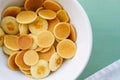 Delicious freshly cooked pancake cereal in a bowl, top view.