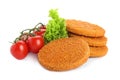 Delicious fried breaded cutlets with cherry tomatoes and lettuce on white background Royalty Free Stock Photo