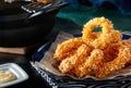 Delicious fried food, fried squid rings. Royalty Free Stock Photo