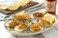 Fried Oysters on Half Shell with Lemon and Hot Sauce Royalty Free Stock Photo