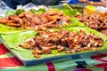 Fried pork cutlet Asian style on banana leaves. Royalty Free Stock Photo