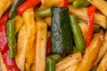 Delicious fried potatoes with bell peppers, asparagus beans, salt and spices