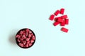 Delicious frozen raspberries are contrasted with chocolates.