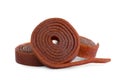 Delicious fruit leather rolls on white background