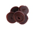 Delicious fruit leather rolls on white background, top view