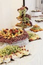 Delicious fruit table at wedding reception in restaurant. Fresh