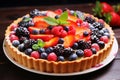 A delicious fruit tart with a flaky pastry crust