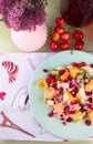 Delicious fruits salad in plate on table Royalty Free Stock Photo