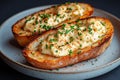 Delicious garlic bread with melted cheese and herbs Royalty Free Stock Photo