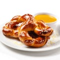 Delicious German Pretzels with Mustard on a Plate.