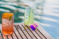 Delicious gin tonic cocktail sby the luxury evening pool Royalty Free Stock Photo