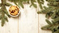 Delicious ginger biscuits. Fir branch. NewYear. Light background Royalty Free Stock Photo