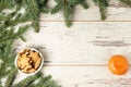 Delicious ginger biscuits. NewYear. Fir branch. One tasty tangerine Royalty Free Stock Photo