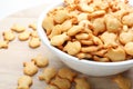 Delicious goldfish crackers in bowl, closeup