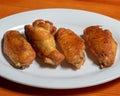 Delicious Gourmet Cuisine: Appetizing Fried Chicken Wings on a Plate