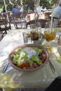 Delicious Greek salad with Feta Cheese for Lunch In the Old Walled Town of Rhodes in Greece Royalty Free Stock Photo