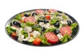 Delicious greek salad on a platter macro frame, close up
