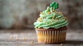 A Delicious Green Cupcake With Gold Sprinkles Royalty Free Stock Photo