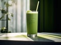 Delicious green matcha latte tea in a tall glass. Aromatic refreshing green mint smoothie in a glass. Generative AI Royalty Free Stock Photo