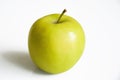 Green ripe apple on a white background. juicy fruit. Royalty Free Stock Photo