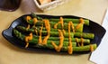 Grilled asparagus with romesco sauce