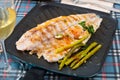 Delicious grilled bass with asparagus