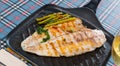 Delicious grilled bass with asparagus