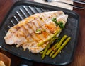 Delicious grilled bass with asparagus