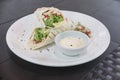 Delicious Grilled Chicken Shawarma with fresh lettuce with a serving of toum or garlic mayonnaise