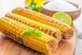Delicious grilled corn with salt and parsley Royalty Free Stock Photo
