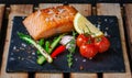 Delicious grilled filet of salmon with green asparagus,