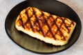 Delicious Grilled haloumi cheese on a plate Royalty Free Stock Photo