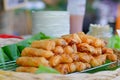 crispy spring roll on banana leave sell in local market of Thailand. Deep fries chinese snack