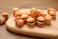 Delicious gummy burger shaped candies on wooden table, closeup Royalty Free Stock Photo