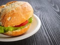 Delicious ham baguettes with fresh lettuce and paprika on an old wooden kitchen table top Royalty Free Stock Photo