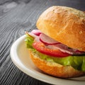 Delicious ham baguettes with fresh lettuce and paprika on an old wooden kitchen table top Royalty Free Stock Photo