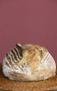 Delicious handmade bread with long natural fermentation on red background