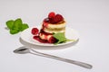 Delicious and healthy cottage cheese pancakes on a white saucer, poured with BlackBerry jam Royalty Free Stock Photo