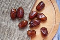 Delicious and healthy dates on burlap.