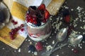 Delicious and healthy dessert of berries with yogurt and muesli