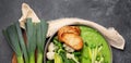 Delicious healthy green cream soup in a bowl with croutons on table Royalty Free Stock Photo